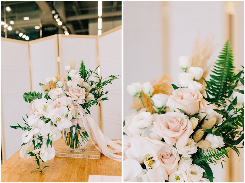 blush pink roses with white orchids in a vase on a table