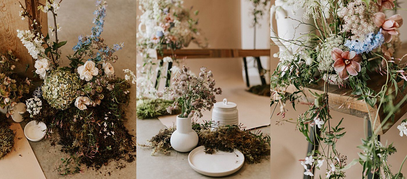 muted florals on a bench with a neutral backdrop, soft blush tones with earthy greens