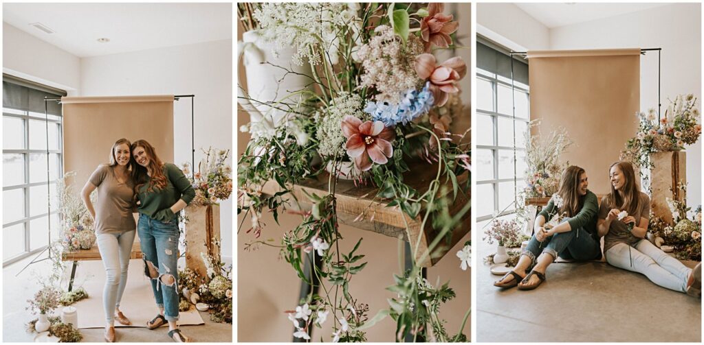 wedding florists in front of floral arrangements