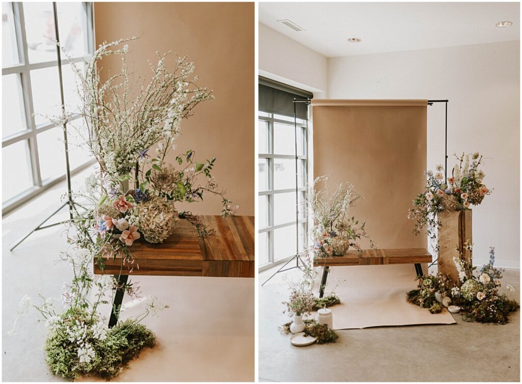 muted florals on a bench with a neutral backdrop, soft blush tones with earthy greens