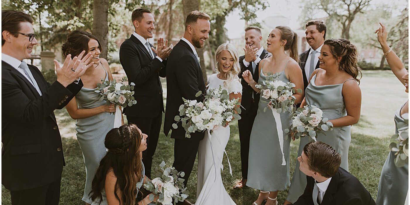 wedding party holding wedding floral bouquets