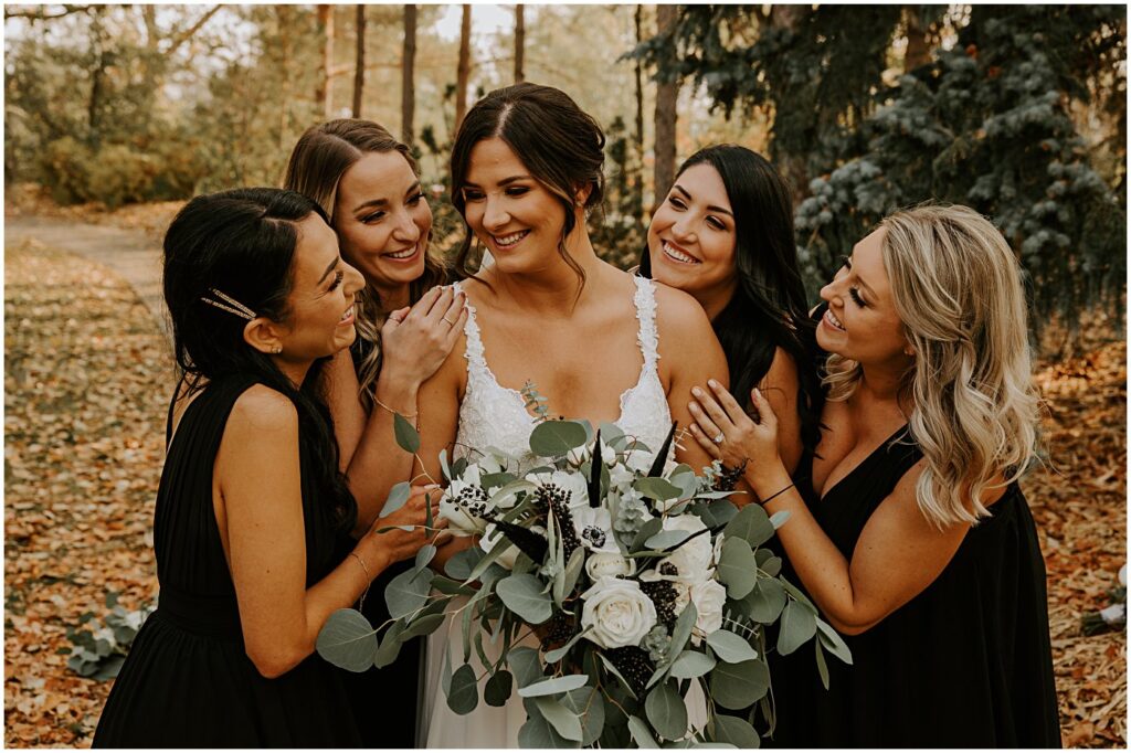 bridesmaids portraits with modern fall wedding florals