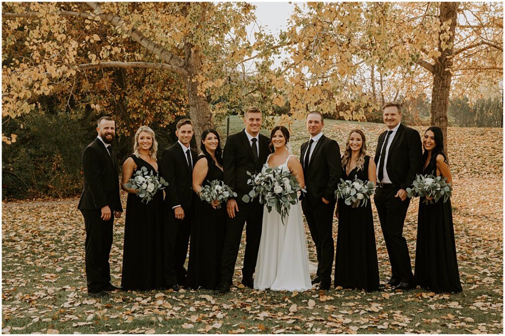 wedding party portraits with modern fall wedding florals
